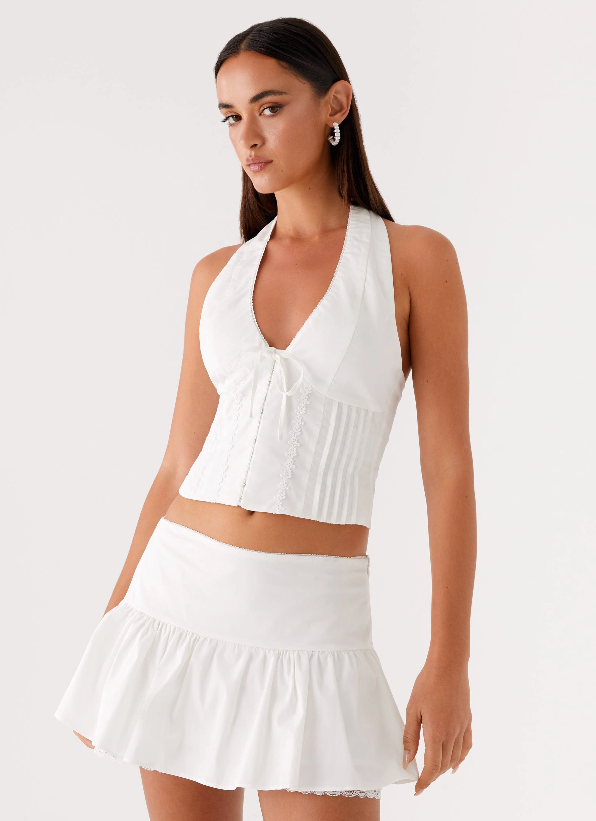 NoiseReduciting Zipper SweatAbsorbent Mavis Halter Top - White